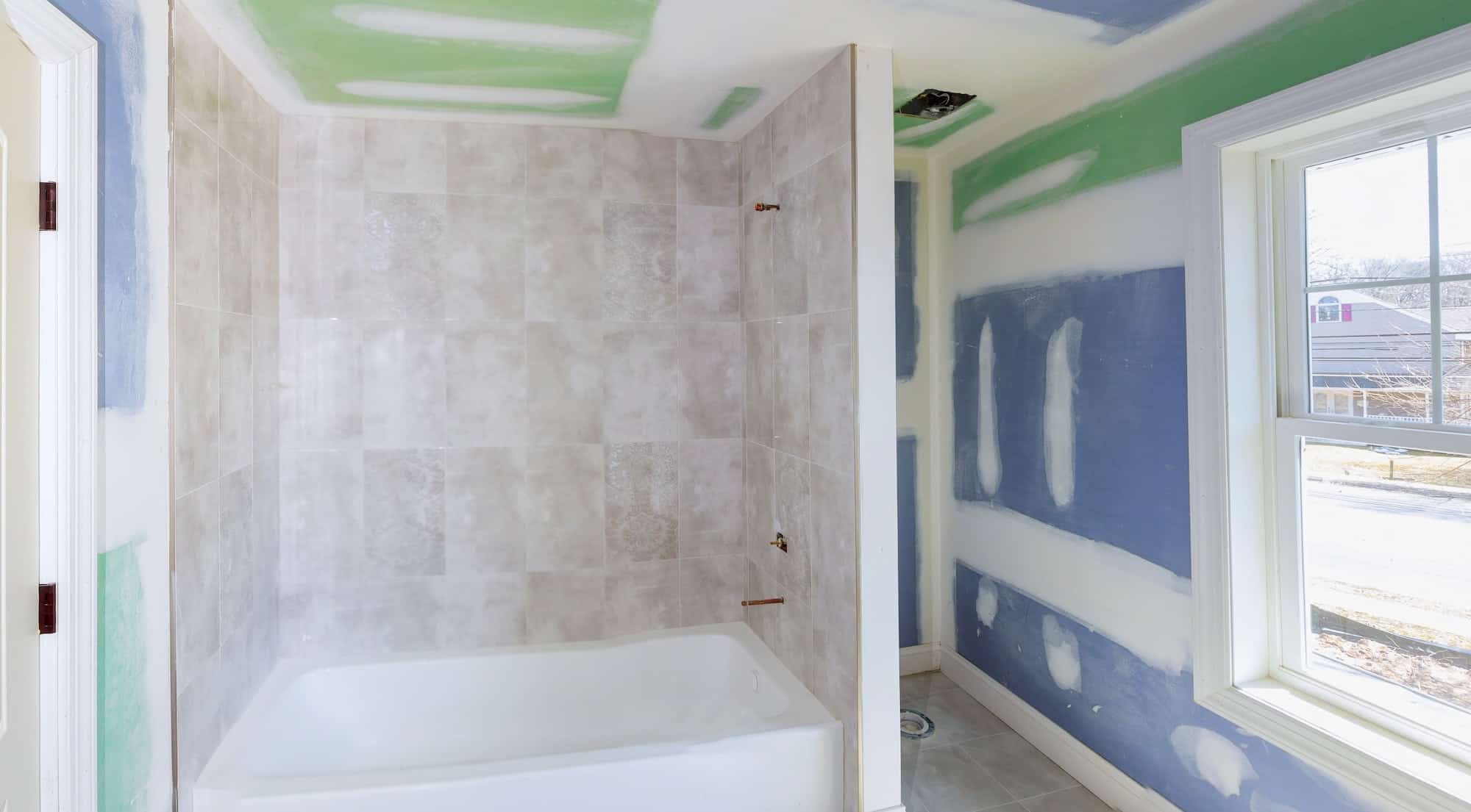 bathroom-remodel-progresses-as-drywall-is-smoothed.jpg