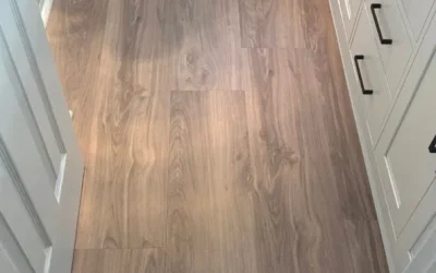 flooring installation in bathroom of residential home in oshawa durham region by vortex construction